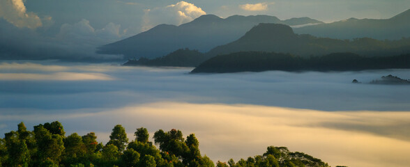 view of the sea of ​​clouds between the hills in the morning