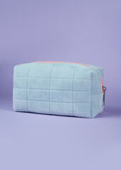 pencil case for makeup on a purple background