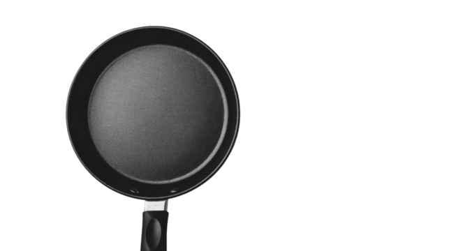 A black frying pan sitting on a plain white background with no other objects in sight