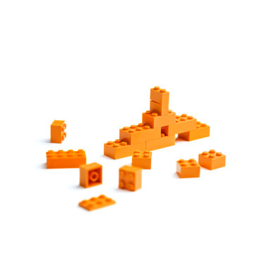 Toy brick blocks over white background