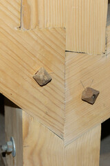 Close-up of Wooden Beam Structure Joint in Construction Framework