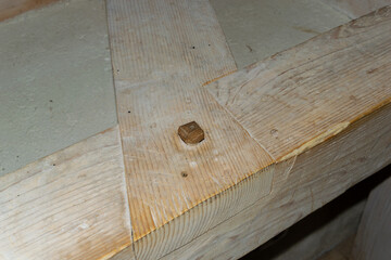 Close-up of Wooden Beam Structure in Construction Framework