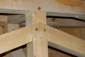 Close-up of Wooden Beam Structure in Construction Framework
