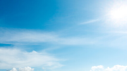 Obraz premium Soft sunlight in morning time with soft blue sky and white clouds background, Good weather day and relaxing time