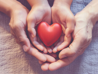 Hands holding a red heart, close-up.Generative AI