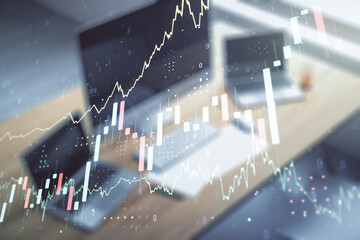 Abstract creative financial graph and modern desktop with pc on background, financial and trading...