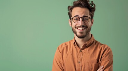 Obraz premium a handsome, smiling business guy wearing a shirt and glasses, feeling confident, isolated on a light green background