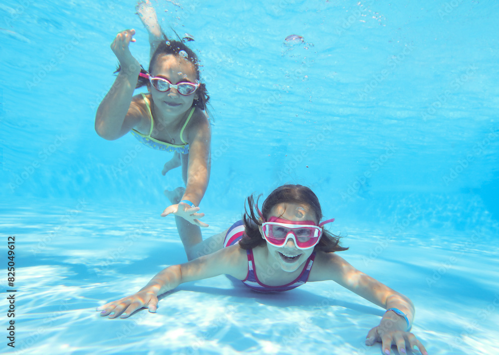 Wall mural kids swimming in pool