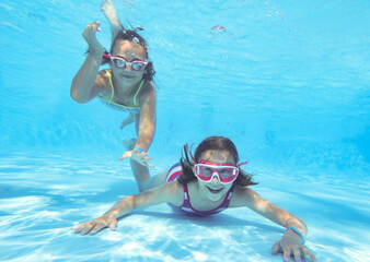 kids swimming in pool