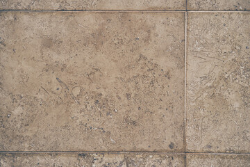 The texture of the beige stone surface. Stone tile with space to copy. High quality photo