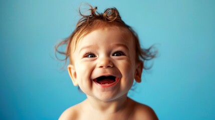 potrait cheerful of baby on clean blue background
