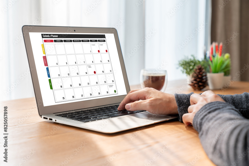 Poster calendar on computer software application for modish schedule planning for personal organizer and on