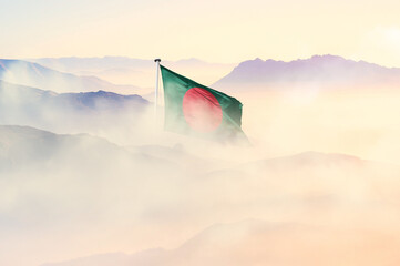 Bangladesh flag disappears in beautiful clouds with fog.
