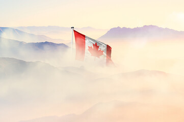 Canada flag disappears in beautiful clouds with fog.