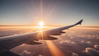 Naklejka premium airplane in the sky, flying and traveling, view from airplane window on the wing on sunset time