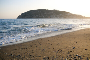 Mediterranean seaside coast with nobody in sunny evening.