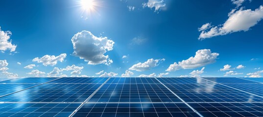 Panoramic shot of solar panel under clear blue sky with ample space for text placement