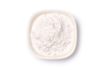 bowl of white flour isolated on white