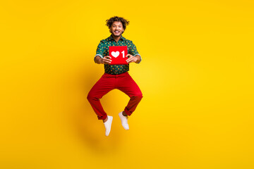 Full size photo of attractive elegant young man jump like logo wear shirt isolated on yellow color...