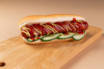 Hot dog on the board.