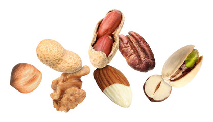Many different nuts in air on white background