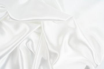 Obraz premium White satin silk wrinkled texture as background
