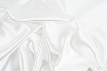 White satin silk wrinkled texture as background