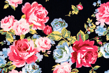 Red rose on black fabric background, Fragment of colorful retro.