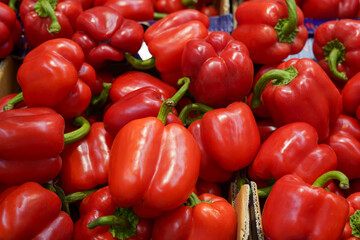 Red bell peppers in the box in grocery store