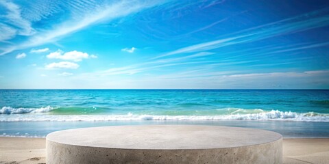 Pristine beach with gentle waves and a clear blue sky.