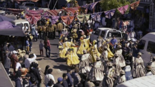 Blurred Traditional Bolivian Women Dancing in Buenos Aires During a Bolivian Community Celebration in Argentina.