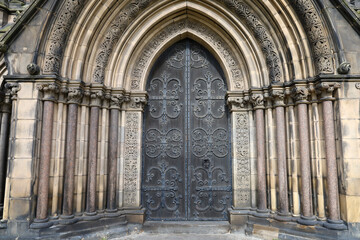 Naklejka premium Beautiful medieval wooden door of a church in Scotland, UK