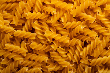 uncooked trivelle pasta for background.Top view