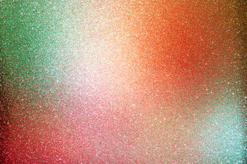 Red green orange golden brown shiny glitter abstract background with space. Twinkling glow stars...