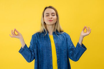 Young pretty woman meditate indoor. Relaxation concept