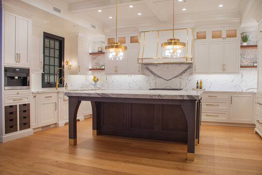 High end kitchen with hardwood floors and marble counter top