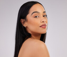 Portrait, beauty and woman with makeup in studio for hair care, glowing skin or keratin treatment...