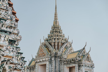 Ornate Thai Temple Spire Against Clear Sky Wat Arun, Bangkok, Thailand