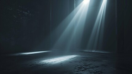 A dark room with a spotlight shining on the floor