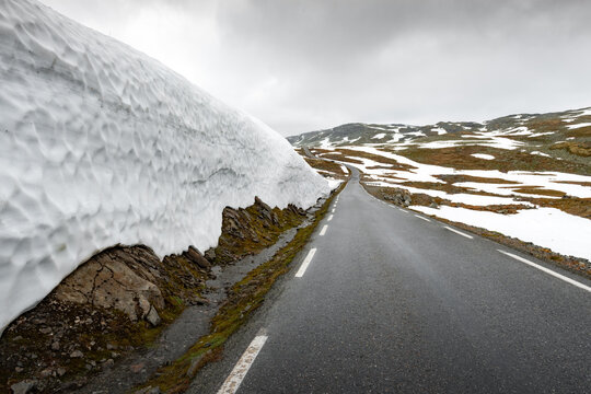Famous mountain snowy road (Aurlandsvegen or Bjorgavegen) in summer time. Norway, Aurland
