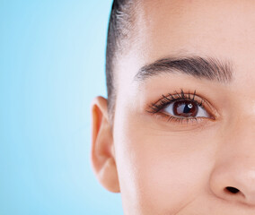 Studio, eye and half portrait of woman with cosmetics, facial skincare and makeup for lashes....