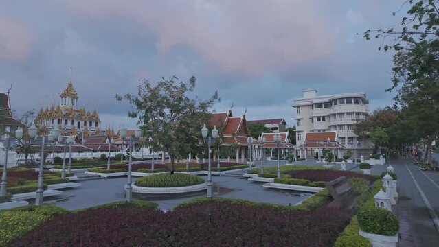 scenery white cloud in blue sky above Prasat,Wat Ratchanatdaram Worawihan.
scenery beautiful The spiers of the golden castle Loha Prasat. The metallic castle covered with gold leaf
