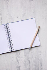 Little white Notepad for checklist and pencil