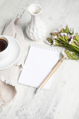 Little white Coffee cup and notepad morning planning