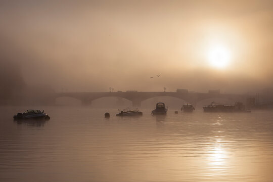 Foggy river Thames at sunrise