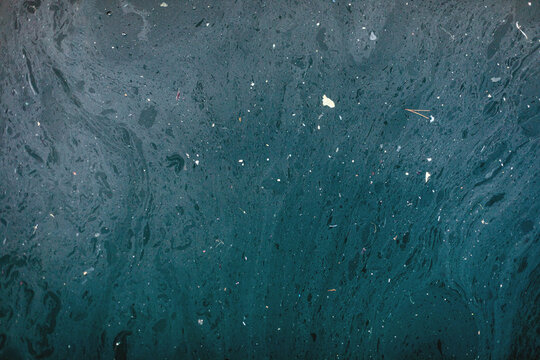 Polluted sea water surface