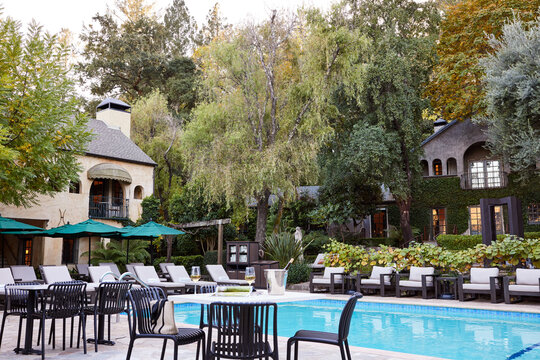 Swimming pool at luxury boutique hotel with table
