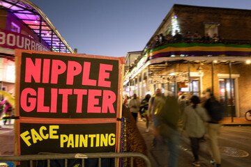 Nipple Glitter and Face Painting on Bourbon St during Mardi Gras