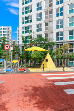 Yellow parasol installed in school zone.