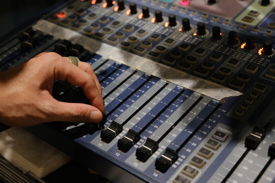 Anonymous Man Working In The Music Studio